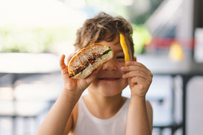 Midsection of woman holding food