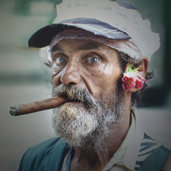 Portrait of man wearing hat