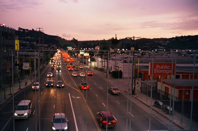 High angle view of traffic on road at sunset