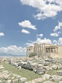 Ruins of historical building against cloudy sky