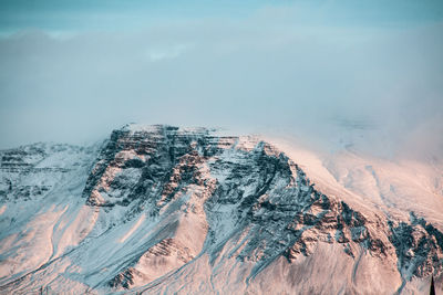 Aerial view of snow covered land