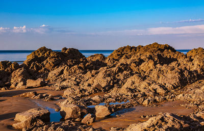 Wild rocky beach in brittany on armor coastline.