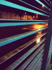 Close-up of railroad tracks at night