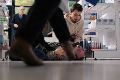 Low section of man exercising in gym