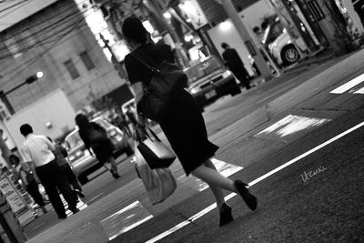 Woman standing in city