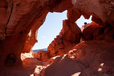 View through a rock arch in the usa desert