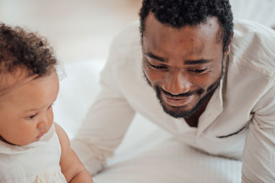 Father playing with daughter