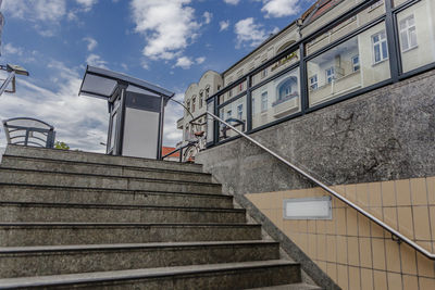 Low angle view of stairs against sky