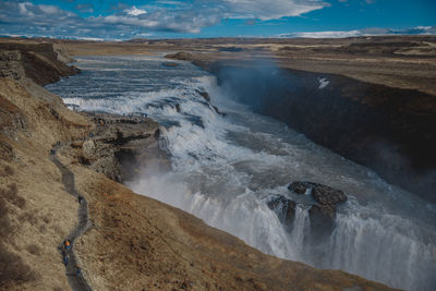 High angle view of waterfall against sky