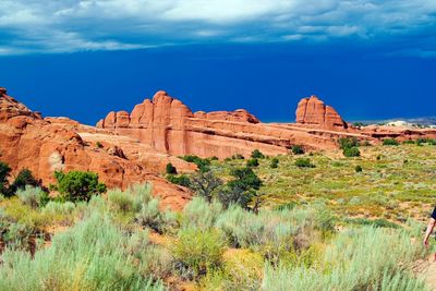 View of rock formations on landscape against sky