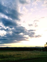 Scenic view of landscape against cloudy sky