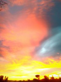 Low angle view of dramatic sky during sunset