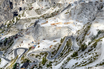 High angle view of rocks on road