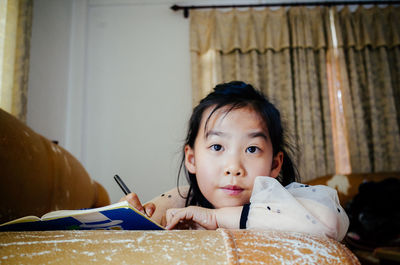 Portrait of cute girl at home