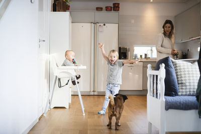 Mother having breakfast with two sons