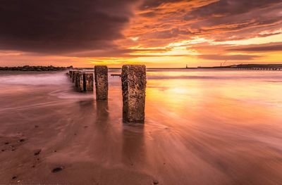 Scenic view of sea against sky at sunset