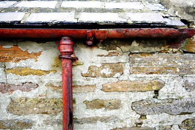 Rusty abandoned brick wall