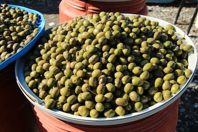 High angle view of green olives for sale