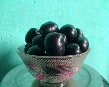 High angle view of blueberries in bowl on table