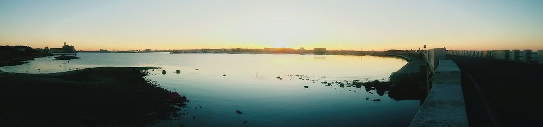 Scenic view of sea at sunset