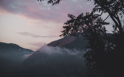 Scenic view of mountains against sky during sunset