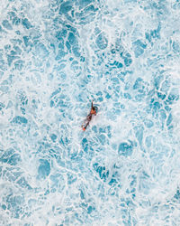 High angle view of person skiing on snow