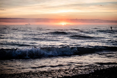 Scenic view of sea against sky during sunset