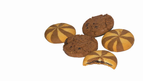 Directly above view of cookies against white background