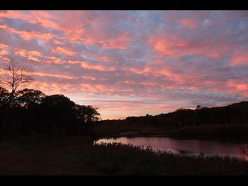 Scenic view of silhouette landscape against sky during sunset