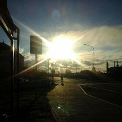 Empty street light at sunset