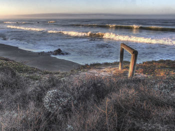 Scenic view of beach against sky