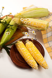 Close-up of corn on table