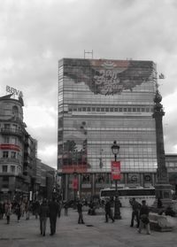 People in front of building