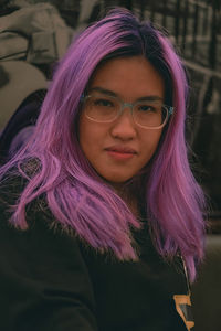 Purple hair girl with glasses