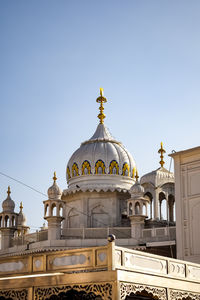 Low angle view of historic building against clear sky