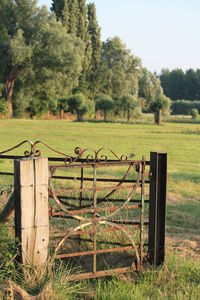 View of wooden fence on field