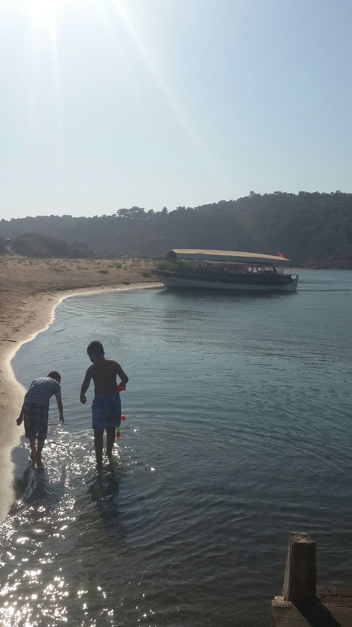 water, two people, outdoors, real people, togetherness, sky, leisure activity, men, nature, day, nautical vessel, beauty in nature, people, adult