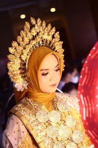 Close-up of smiling bride during wedding ceremony