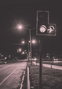 Street lights on road at night