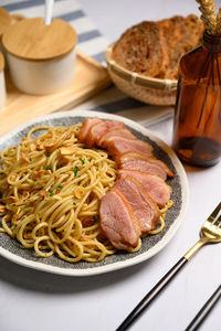 Close-up of noodles in bowl on table