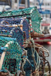 Close-up of fishing net on harbor