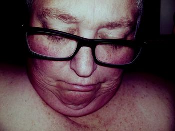 Close-up of man wearing eyeglasses