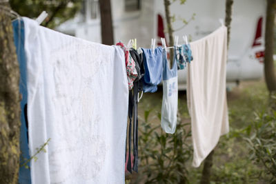 Clothes drying on clothesline at yard