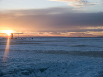 Scenic view of sea at sunset