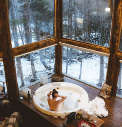 High angle view of glass window on table