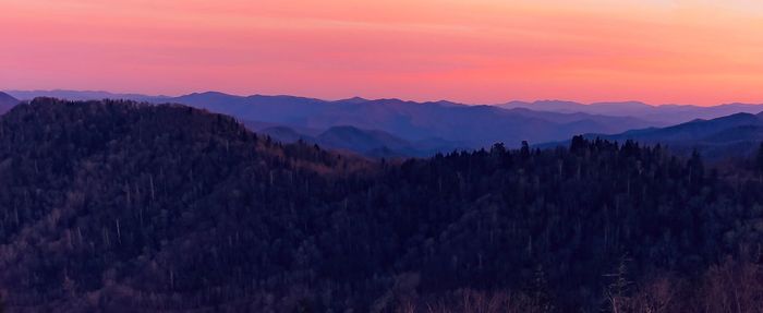 Scenic view of mountains against sky during sunset