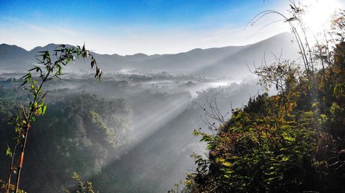 Scenic view of mountains against sky