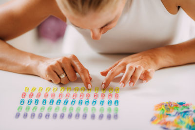 Obsessive compulsive disorder. arranging paperclips in a row.