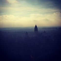 Scenic view of landscape against sky at sunset