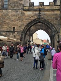 Tourists in front of building